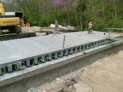 Eight Mile Road, the first site in the U.S. to use a Fiber Reinforced Polymer (FRP) composite superstructure. It also used a drop-in-place technology.