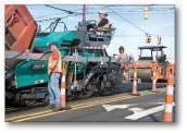 King Asphalt uses Hamm HD+ 120 VV HF roller in conjunction with Vision 5200-2 paver for urban work in Greenville, South Carolina.