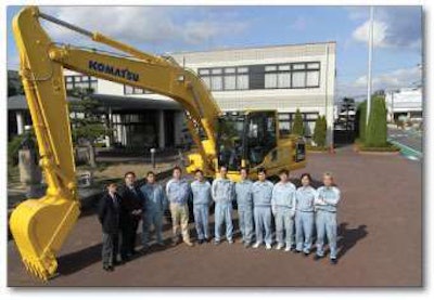 The team in Japan that produced the Komatsu hybrid excavator from the System Development Center and the Construction Equipment Technical Center. From left to right: Teiichirou Chiba, project manager; Yoshitaka Niigaki, project manager; Shunsuke Yoshioka, project manager; Jun Morinaga, project manager; Takayoshi Endo, project manager; Yuji Ozawa, chief engineer; Toshiharu Kurosawa; Takumi Onoda, project manager; Kouzou Suzuki, project manager; Hiroshi Yoshida, project manager; and Hiroaki Inoue, project manager.