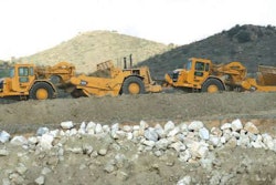 Carrying 22 cubic yards and going 32 miles per hour, a scraper like this can make you a lot of money, or make you broke, in a hurry.