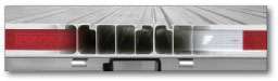 The single piece floor design incorporates the crossmembers into the body of the floor, improving strength and maintaining structural integrity under load.