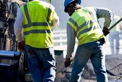 two construction workers stock