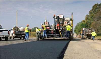 Trimble's PCS900 Paving Control System is a 3D extension of the 2D PCS400, thus allowing the asphalt paving contractor a choice between sonic sensors, slope sensor, sonic averaging beam, 3D slope and 3D elevation control. Photo courtesy of Trimble Photo