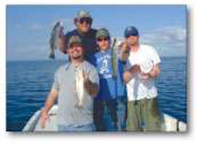 Jason takes his employees on at least one recreational outing every year. Shown here (l. to r.) Brent Nixson, Jason’s father Leonard, Jason and Dustin Crawley.