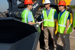 Contracting firm J.H. Reid, South Plainfield, New Jersey, takes delivery of the first John Deere 744K IT4 wheel loader.