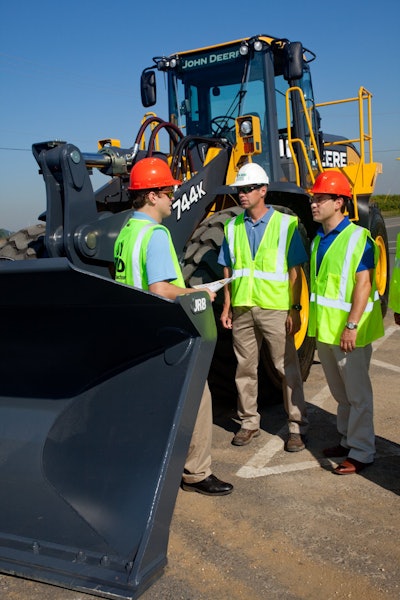 Contracting firm J.H. Reid, South Plainfield, New Jersey, takes delivery of the first John Deere 744K IT4 wheel loader.