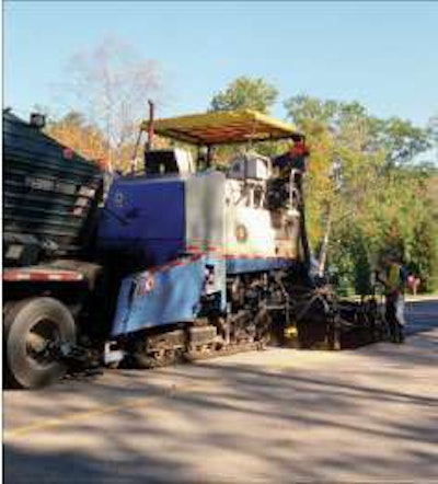 A modified paver places NovaChip wearing course in Michigan. Photo by Tom Kuennen