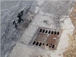 As illustrated in these pictures (from top to bottom): existing damaged pavement; repair is squared, cleaned of debris and tacked; and final repaired pothole.