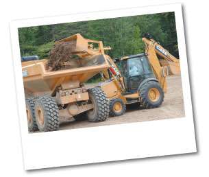 By lengthening the loader by about 4 inches, the N Series backhoe loader can center-load haul trucks, including the 30-metric-ton Case 330B.