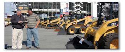 Wayne Calton of South Carolina-based Cat dealer Gregory Poole goes over the options available with Kevin Roth from the Cleveland, Ohio, area.