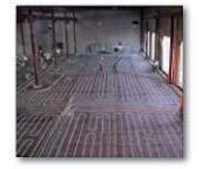 Hydronic heating systems run hot water through tubing buried in the concrete floor. On cold days the heat keeps your feet and body warm without having to waste a lot of energy heating the full volume of air in the shop.