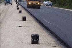 Rollers compact the 50-percent RAP mat on Manitoba PTH 8.