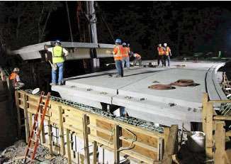 A precast, prestressed panel is placed on I-287 ramp in New Jersey.