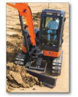 Easily adjusted via buttons located on top of the blade control lever, a blade capable of angling up to 25 degrees left or right provides the Hitachi Zaxis 50U-3 compact excavator with backfilling efficiencies. The same feature is available on the corresponding John Deere excavator, the 50D.