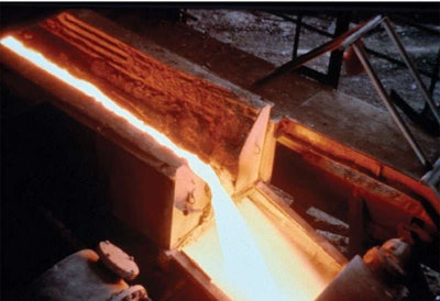 Jet process granulator (bottom) produces slag in a glassy, amorphous state that complements portland cement concrete.