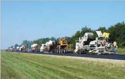 In Kansas, a Mobile Asphalt Resurfacing System of Dustrol Inc. hot-in-place recycles U.S. 75.