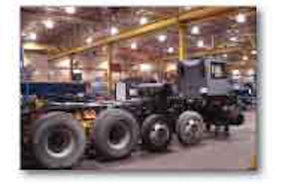 Commonly reused components include the engine, transmission, transfer case, drive axles, wheels, tires, drum drive transmission and hydrostatic pump and motor for the drum.