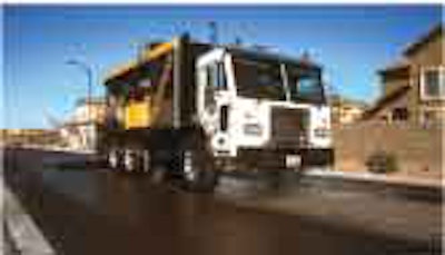 Slurry surfacing is a step beyond conventional chip seals and requires specialized application equipment, but with potential benefits. Photo courtesy of VSS Macropaver