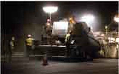 A rubberized thin wearing course is placed by Sunland Asphalt on California State Highway 99 south of Fresno; high-performance surface treatment prolongs highway’s life while standing up to brutal California traffic. Photo courtesy of Vögele America