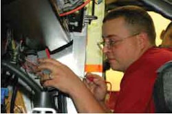 Give your technicians a chance to show off. Many large fleets hold technician rodeos, competitions that can mean both extra recognition and money. Here, a technician demonstrates his skills at a U.S. Postal Service SuperTech competition. Small contractors could scale such a competition down to meet their needs – and have some extra fun.