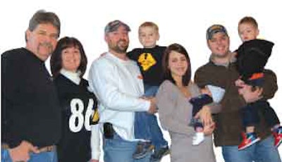 From left: dad David, mom Susan, Bryan holding son Caden, Bryan’s wife Brittnei holding newborn Cruiz, and Chris holding Bryan’s son Chace.