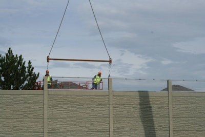 An installation of panels along the Windsor Essex Parkway with a temporary top framing piece still attached