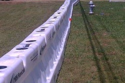 PGA tournament officials added 5,000 feet of Yodock water filled barriers and barricades along the highway from Medlock Crossing to the Athletic Club as part of a comprehensive traffic control plan to manage pedestrian crossings during the four day event