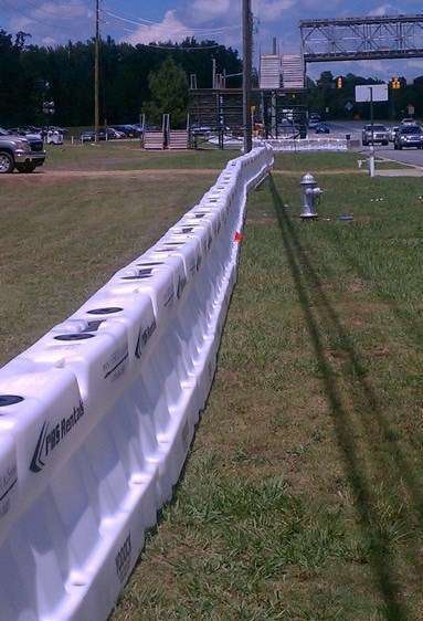 PGA tournament officials added 5,000 feet of Yodock water filled barriers and barricades along the highway from Medlock Crossing to the Athletic Club as part of a comprehensive traffic control plan to manage pedestrian crossings during the four day event