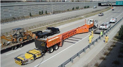 The Mobile Barrier Trailer configures from 42 feet to more than 100 feet in length.