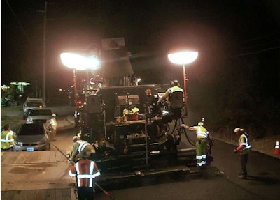 On Napa Valley’s Silverado Trail, a specialized paver places tack coat at the rate of 0.17 to 0.20 gallons per square yard in advance of rubber-modified open-graded friction course.