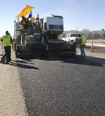 A next-generation polymer-modified open-graded friction course is placed on a Clark County, Nev., street.
