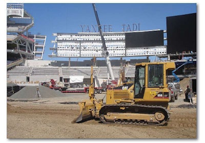 Sports Construction Group has leveraged its heritage in heavy highway construction into the niche sports field site prep and installation business. Here, one of SCG’s Caterpillar D5G LGP crawler dozers takes to the field at Yankee Stadium.