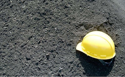 Processed, ground reclaimed asphalt shingles await addition to asphalt mix near Waco, Tex., and are a low-volume adjunct to RAP.