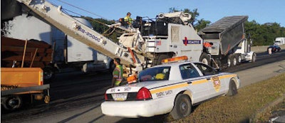 To deter speeding drivers around his crews, Tresco bought two used police cars and parks them at his worksites.