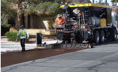 Unit of American Asphalt and Grading Company places slurry seal as part of year-long work with the City of Las Vegas in 2009