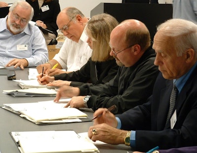 Community advisory committee at work during a meeting. Its role involved recommending change in the best interest of the community