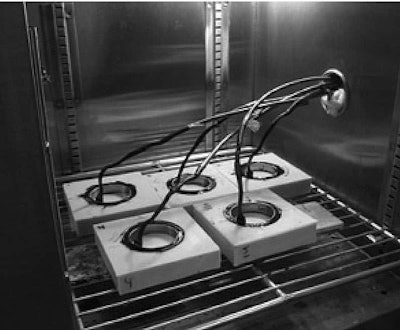 With the new Asphalt Binder Cracking Device (ABCD), asphalt binder is poured around the rings, then cooled to a very low temperature in a controlled manner.