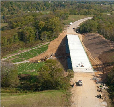 It’s easy to see where the earth slid under the onslaught of a massive rainfall. Tennessee DOT’s decision to replace the stretch of road that the slide collapsed with a 684.5-foot-long, three, lane bridge was an innovative and cost-effective response to a tough engineering problem.