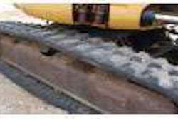 TRACKS — Anchor the machine with the bucket on one side, and tilt it up. Then run the track on the elevated side, looking for cuts, missing chunks or dry rot in the rubber. Repeat on the other side.