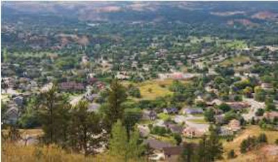 Keeping the roadsides mowed is a jurisdictional challenge in the western South Dakota community of Rapid City (pop. 68,000).