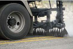 Asphalt emulsions – here sprayed in advance of chip spreader – are essential to nearly every aspect of pavement preservation.