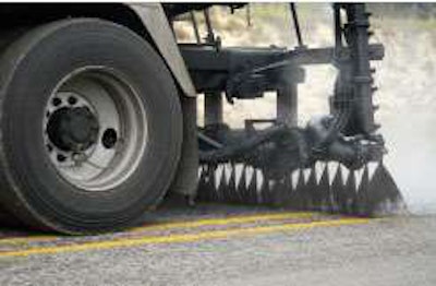 Asphalt emulsions – here sprayed in advance of chip spreader – are essential to nearly every aspect of pavement preservation.