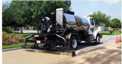 Rejuvenator is placed on Travis County, Tex., streets; the distinctive color disappears when the emulsion ‘breaks.’