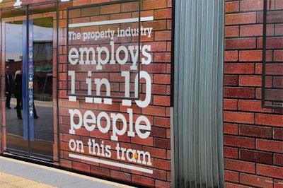 Letting commuters know how many people construction employs.