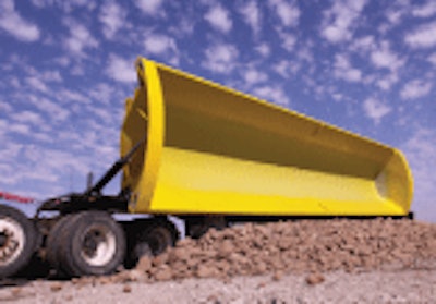 SmithCo’s side-dump design features abrasion-resistant AR400 steel for the tub, and T1 steel for the I-beam frame, which reduces weight to allow for a bigger payload.