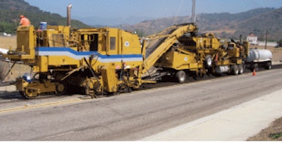 The cold-in-place recycling train features a milling machine followed by a recycler, which crushes the RAP, screens it, mixes it with emulsion and lays the material down in a windrow.