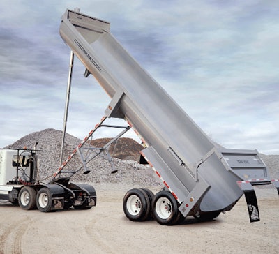 Trail King’s steel half-round trailer has a AR-400 steel body shell, bulkhead and tailgate that can handle sand, gravel, crushed stone, shot rock, rip rap and other abrasive materials.