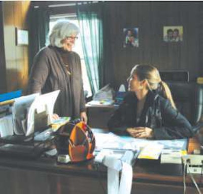 Debbie Graham, left, talks with Casey Graham-Reilly, who runs the office and serves as the company’s safety manager.