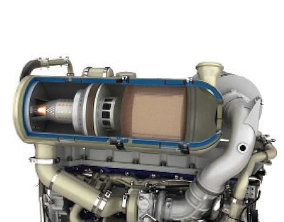 With the exhaust flow going from left to right, the nozzle and flame generate heat going into the DOC/DPF to burn off soot trapped in the DPF.