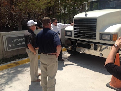 Checking out the Mack Trucks demonstration at the Construction Symposium, an industry event held Aug. 21-23 in Dallas, Texas, and hosted by Equipment World editors.